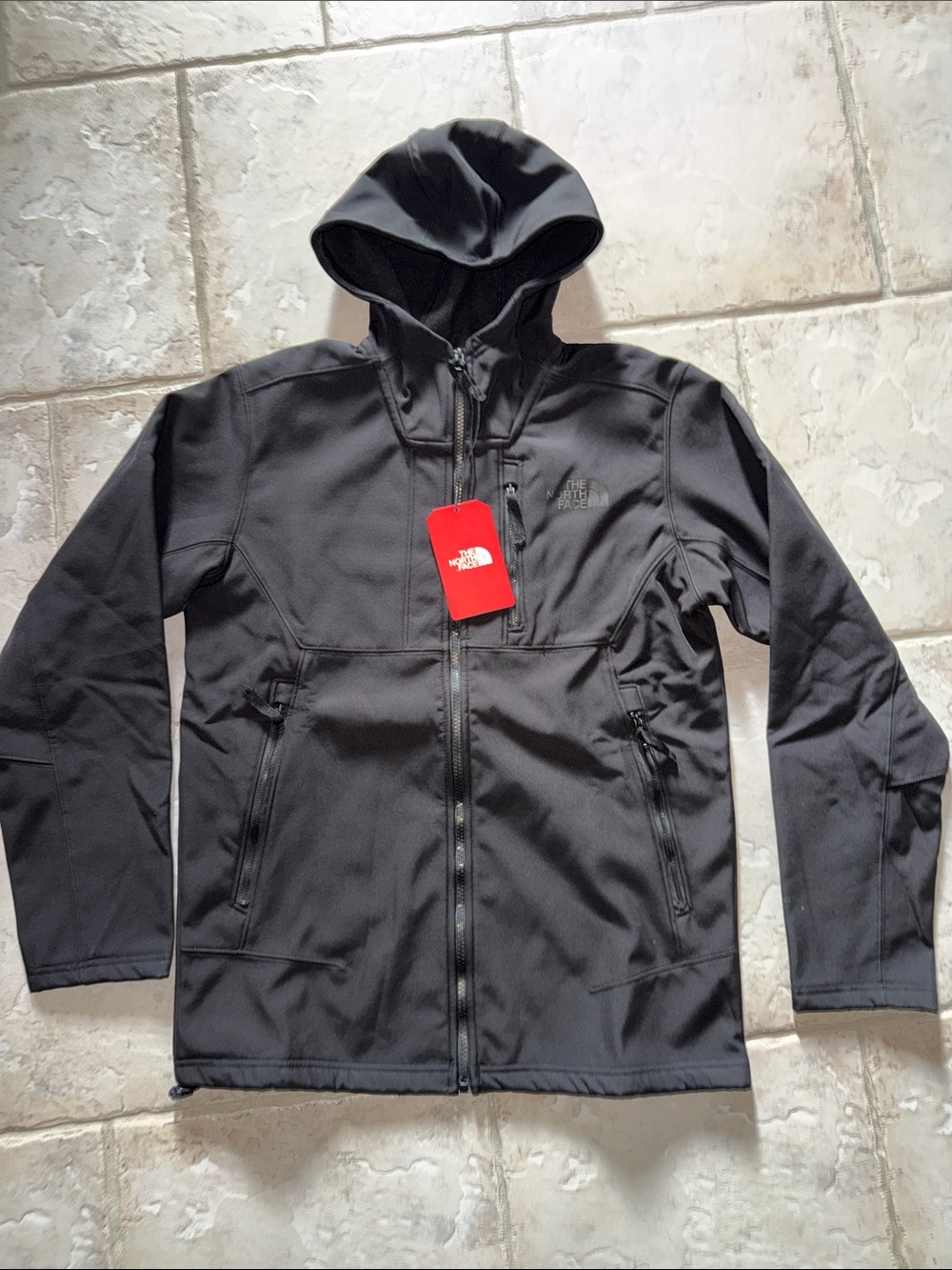 Men’s black Northface Apex jacket with hood